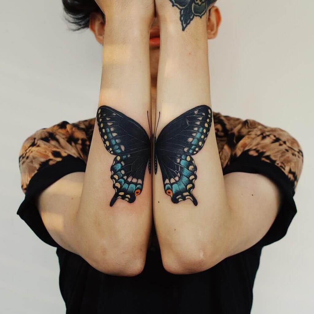 both hands butterfly tattoos