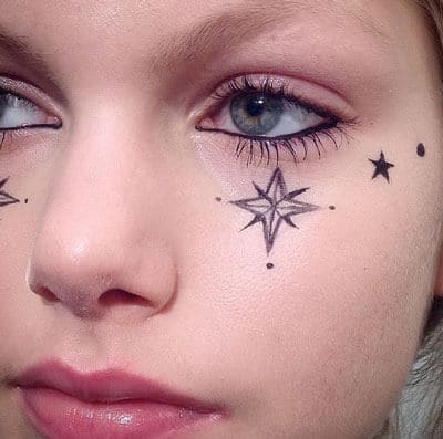 Star Tattoo on face