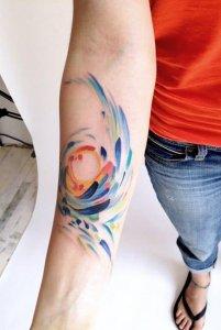 Watercolor tattooing style