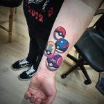Pokemon tattoo on the forearm