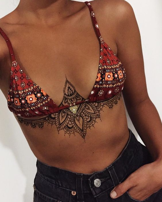 Cool mandala tattoo on breast