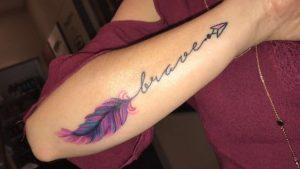 Feather arrow tattoo