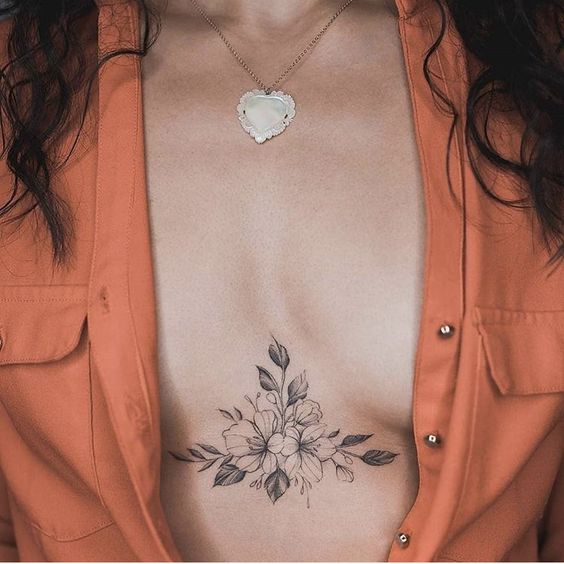 Flowers underboob tattoo