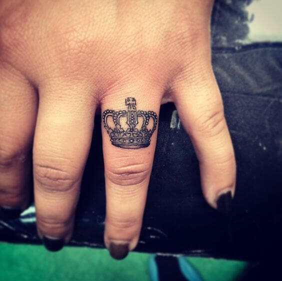 Pretty little Crown finger tattoo