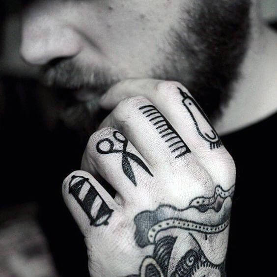 barber scissor finger tattoo