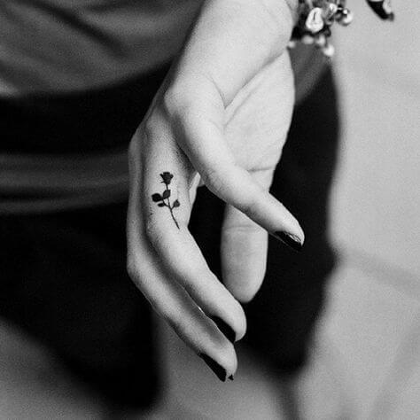 black rose finger tattoo for women