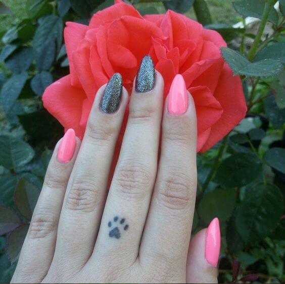 cute Dog Paw finger tattoo