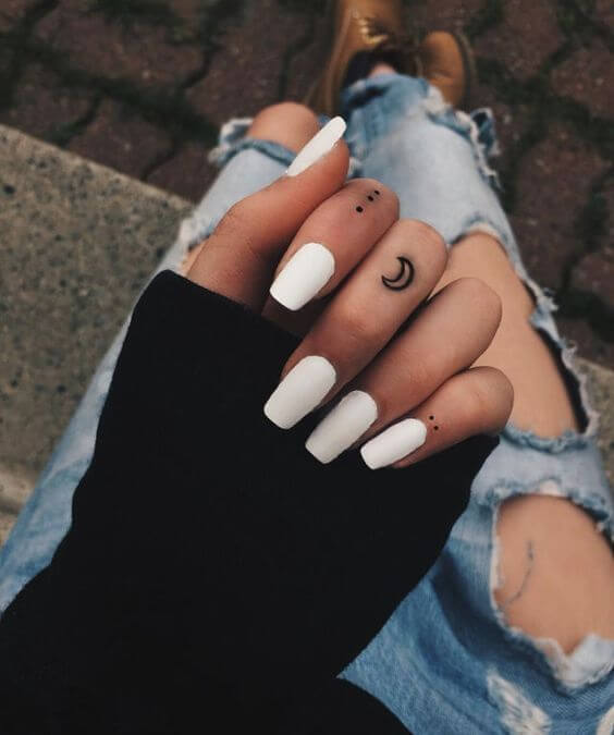 moon finger tattoo