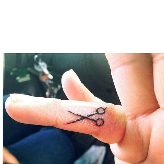 scissor finger tattoo