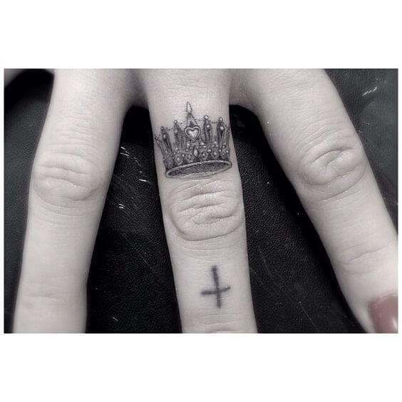 small Crown finger tattoo