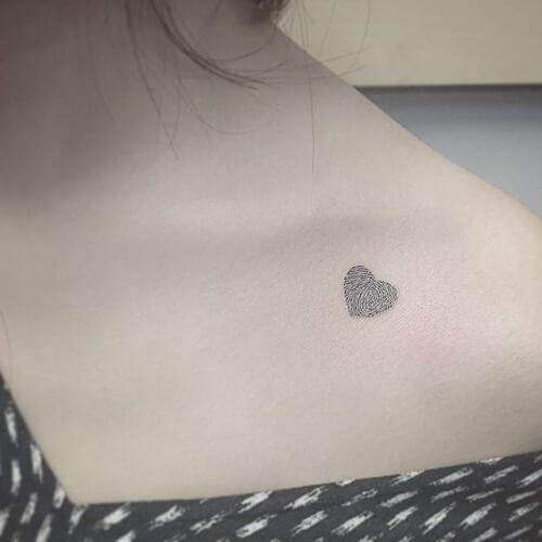 small fingerprint Heart tattoo