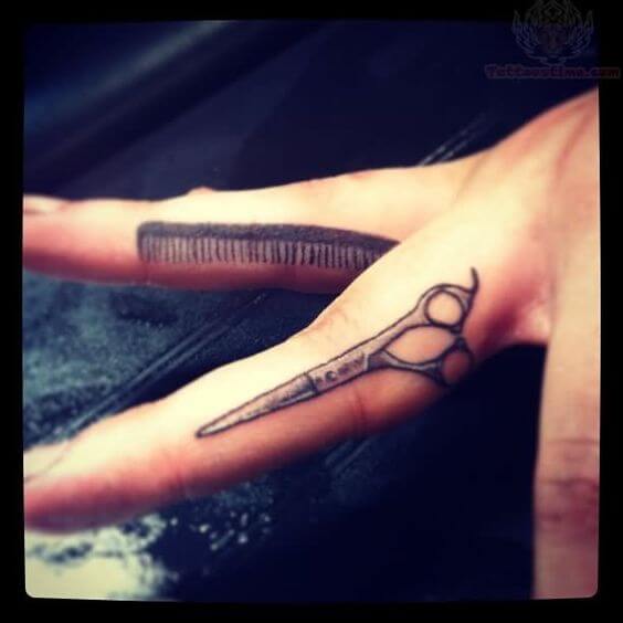 small scissor finger tattoo