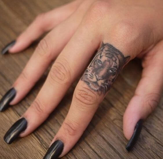 tiger finger tattoo for women