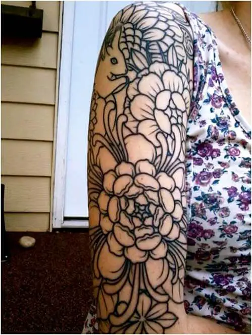 Floral half-sleeve tattoo for women