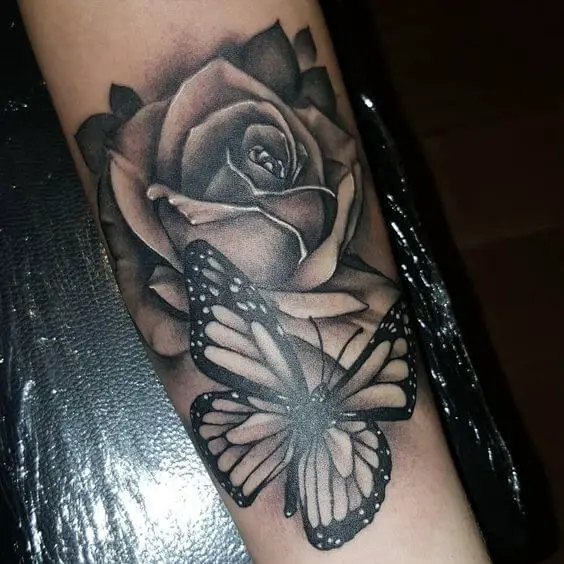 black rose and butterfly tattoo