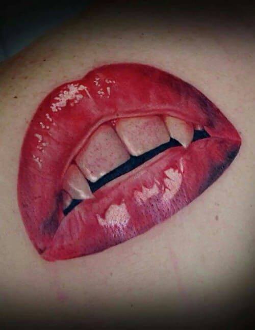 vampire teeth tattoo