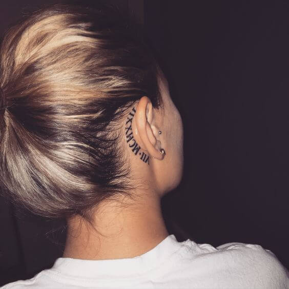 Behind the ear tattoo