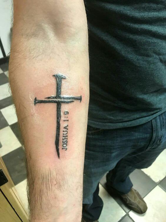 Nail cross tattoo