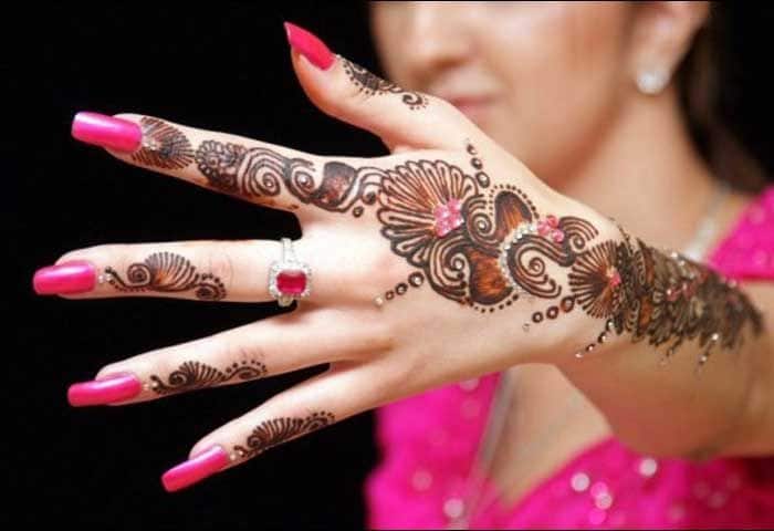 Women tattoo on hand and fingers