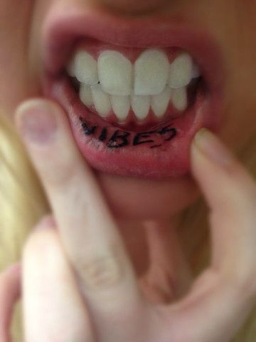 Women lip tattoo