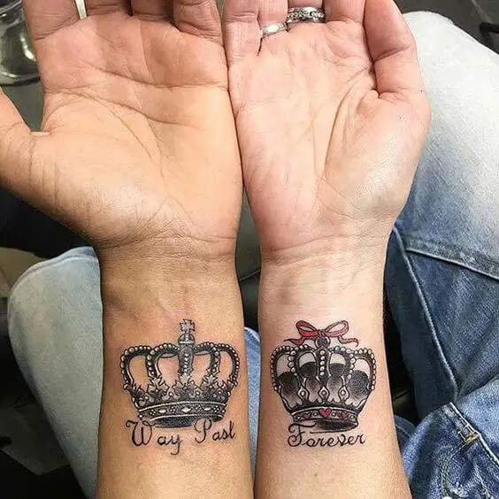 matching crown tattoos couples