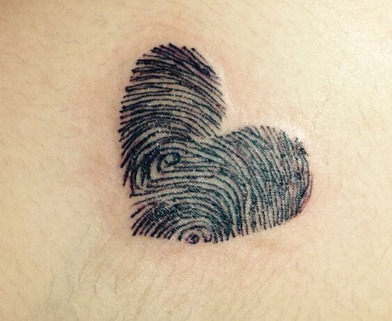 Fingerprint tattoo on hand