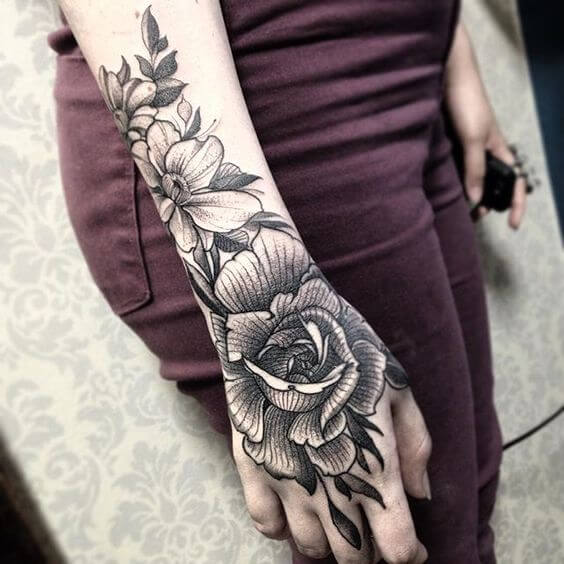 Flower tattoo on hand