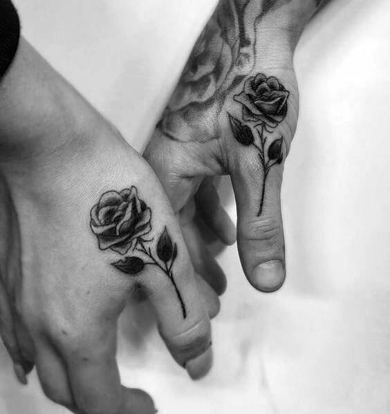 Matching tattoos on both hands