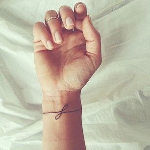 Simple infinity loop tattoo