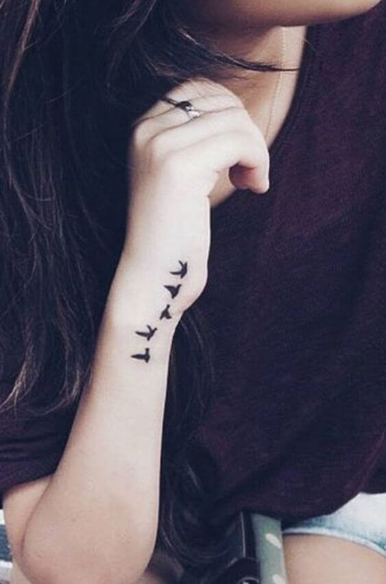 Sparrow silhouette tattoo
