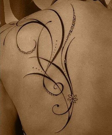hip swirl tattoo