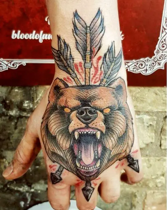 neo traditional bear tattoo on hand