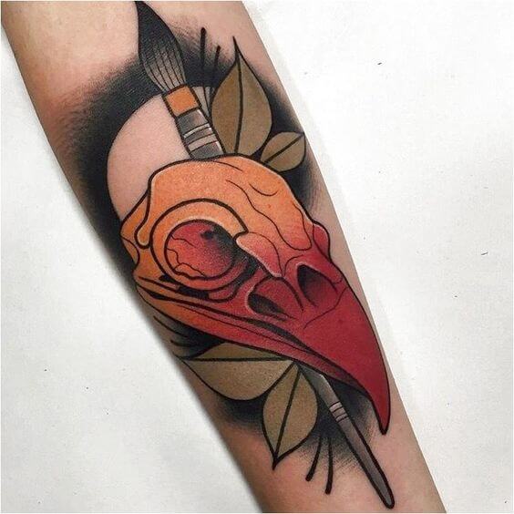neo traditional skull bird tattoo