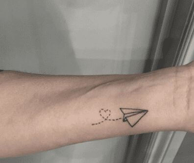 paper plane tattoo