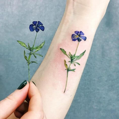 pressed flower tattoo