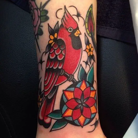 red neo traditional bird tattoo