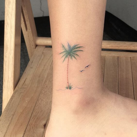 small palms tree tattoo