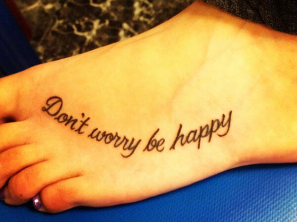 Don’t worry be happy foot tattoo