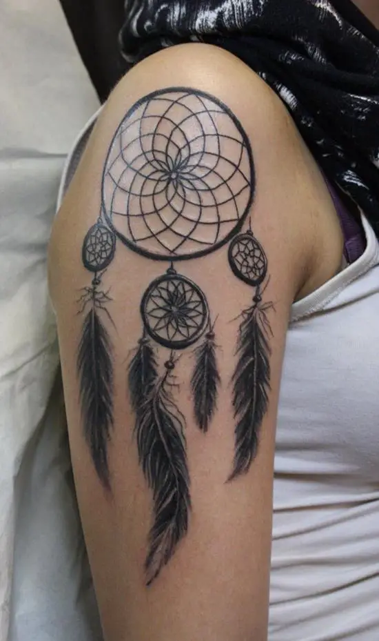 Dreamcatchers bicep tattoos