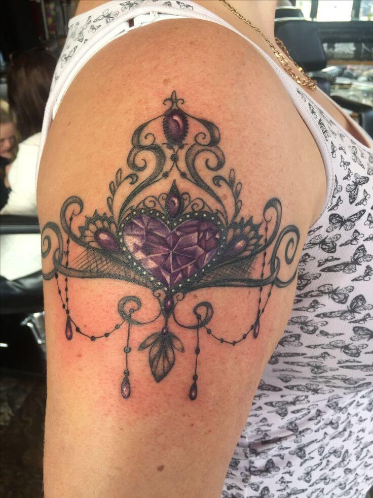 Gems tattoo for women on bicep
