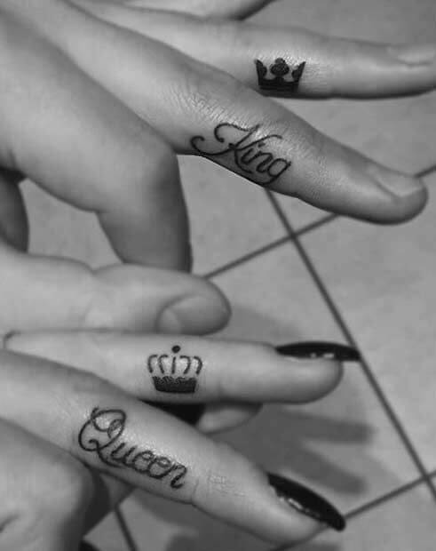 King and Queen writing finger tattoo