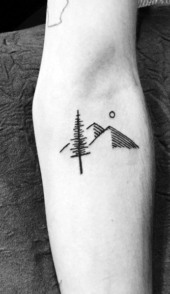 Minimalist mountain and a tree tattoo