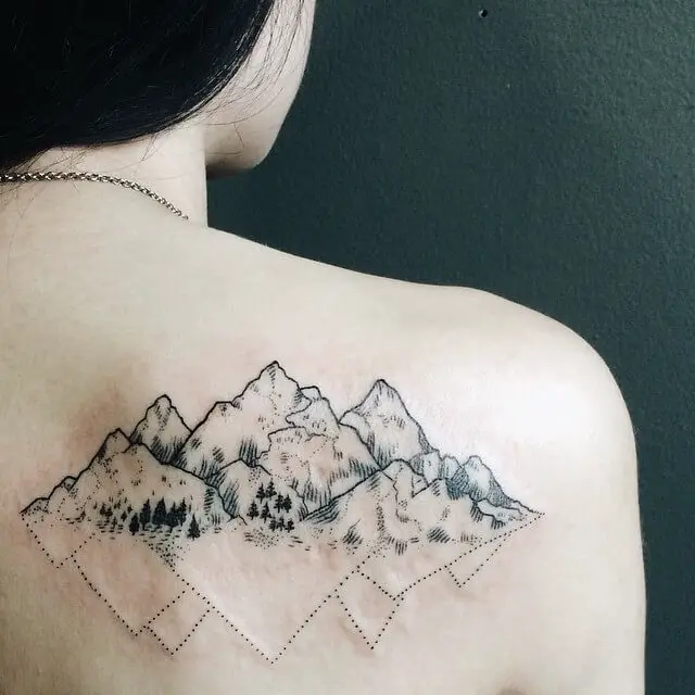 Mountain range tattoo for women