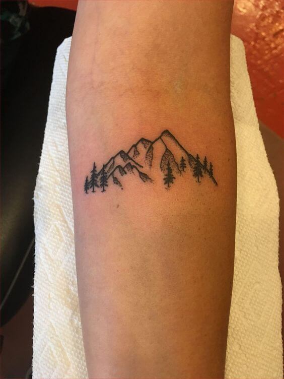Simple mountains tattoo