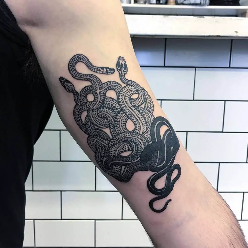 Snake bicep tattoos