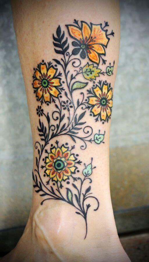 Yellow flowers tattoo