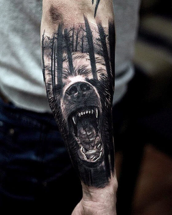 bear in the woods bicep tattoo