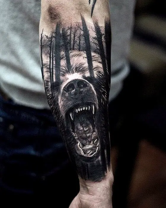 bear in the woods bicep tattoo