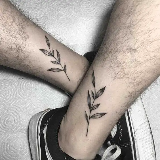 calves leaf tattoo for men