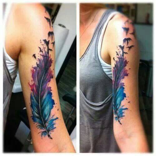 color Feathers bicep tattoo idea